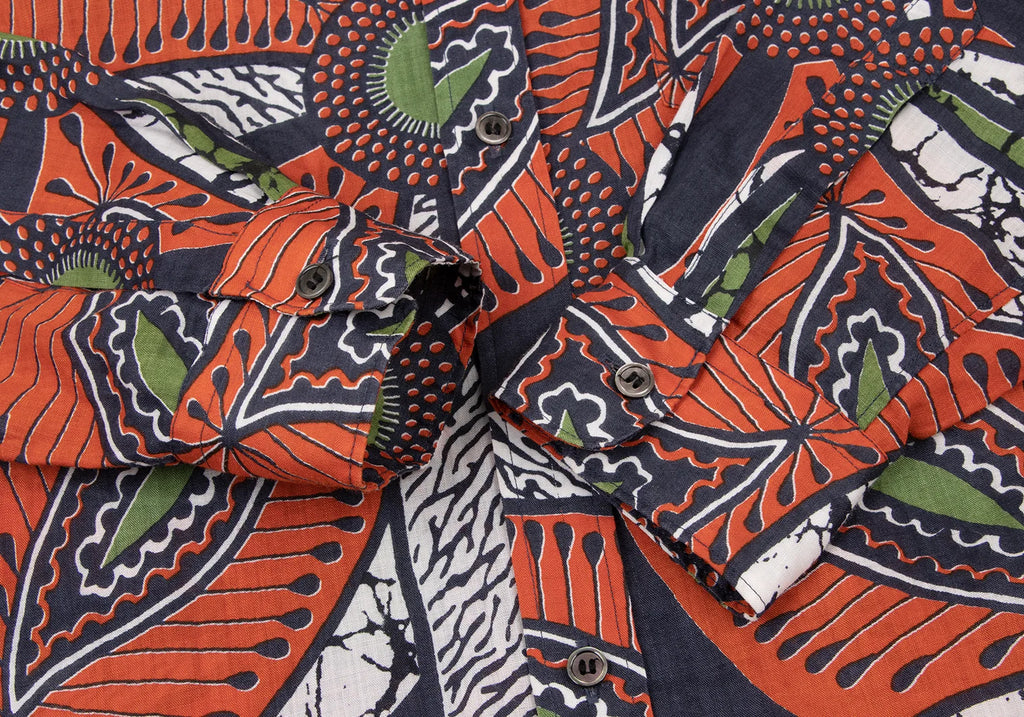 COMME des GARCON JUNYA WATANABE JAPAN. Orange Printed Asymmetry Dress