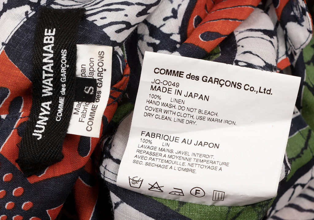 COMME des GARCON JUNYA WATANABE JAPAN. Orange Printed Asymmetry Dress