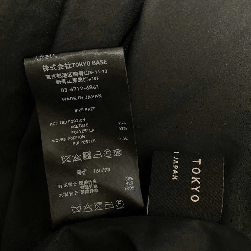 UNITED TOKYO JAPAN. Acetate/Poly Blend Navy, Black Oblique Cut Knit Dress