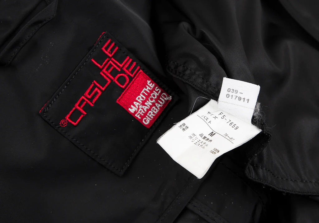 MARITHE + FRANCOIS GIRBAUD Paris. Black Gather Poly Coat