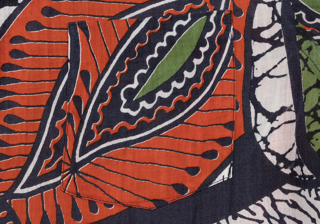 COMME des GARCON JUNYA WATANABE JAPAN. Orange Printed Asymmetry Dress