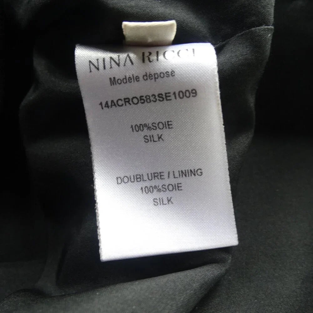 NINA RICCI PARIS. Black Silk Folded/Pleated