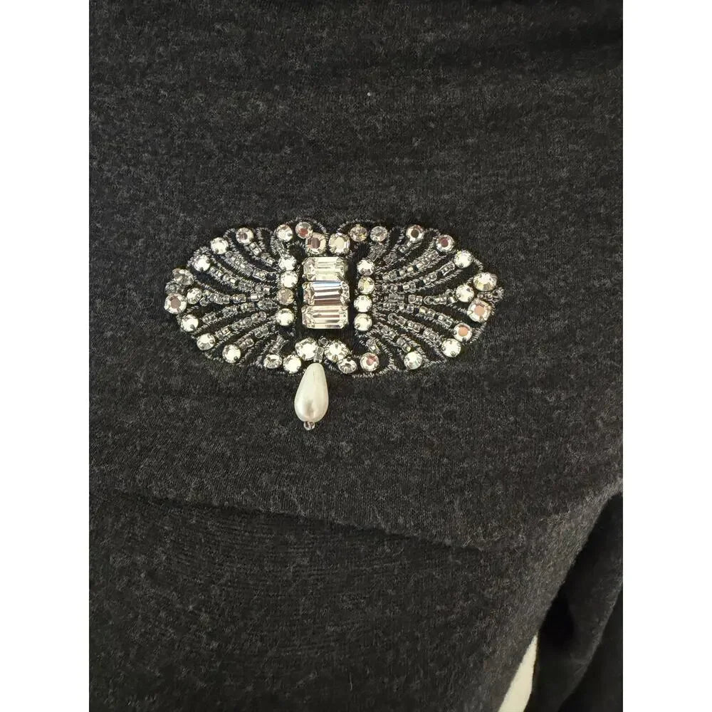 Blumarine Italy. ANNA MOLINARI.  Heather Gray Off-Shoulder Top Jeweled Brooch