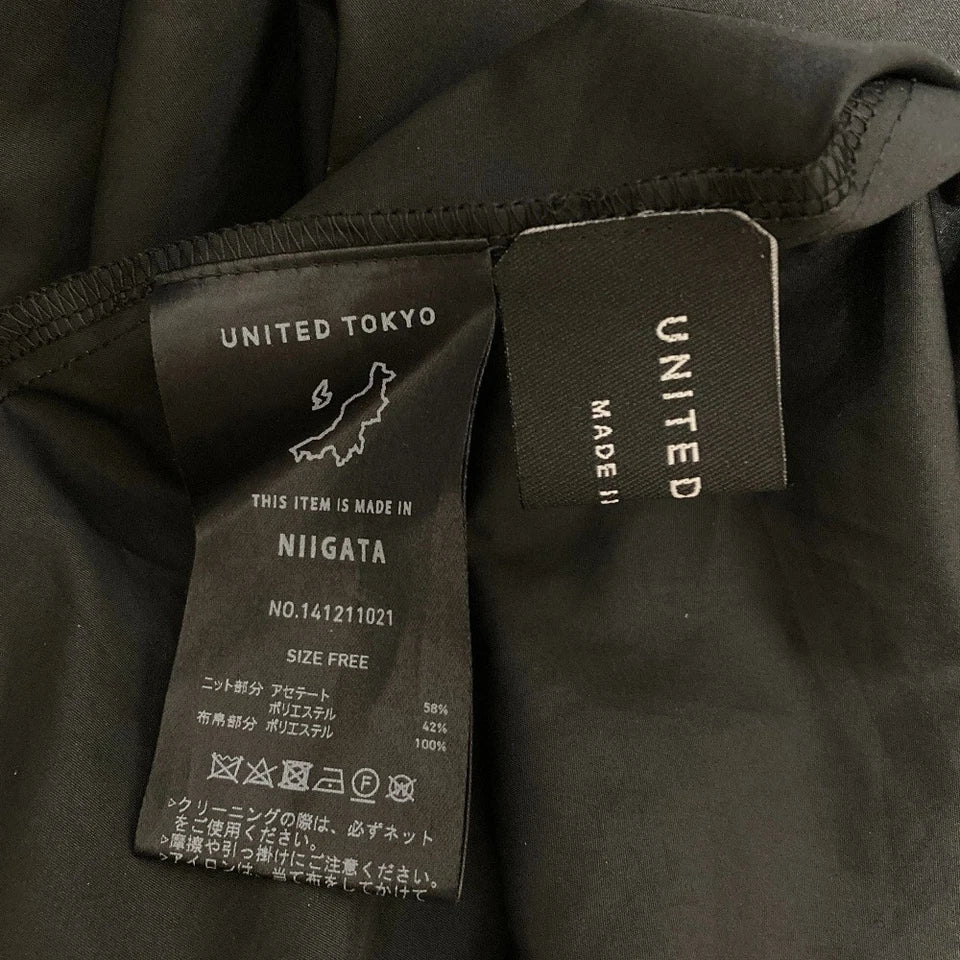 UNITED TOKYO JAPAN. Acetate/Poly Blend Navy, Black Oblique Cut Knit Dress