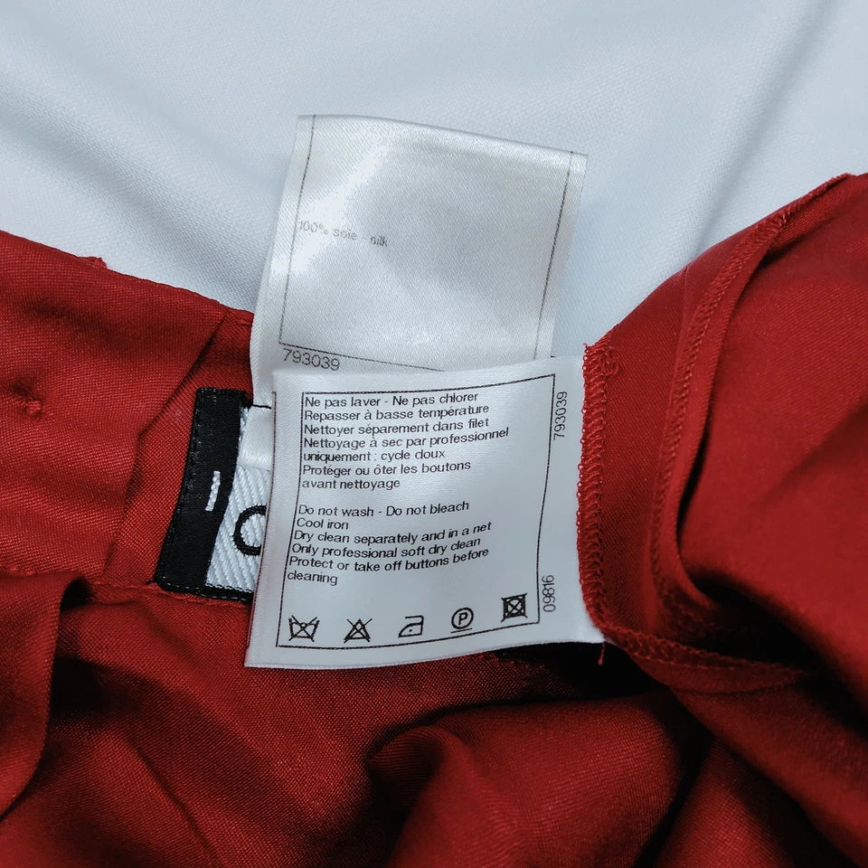 CHANEL PARIS. Vintage Burgundy Red Silk Chanel Buttons Shoulder, and Back Top