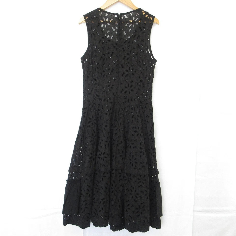 COMME des GARCONS JAPAN. TRICOT. Black Cutwork Sleeveless Dress